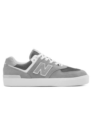 New Balance Sneakers Numeric 574 Vulkanisierte Schuhe in Grau & Weiß